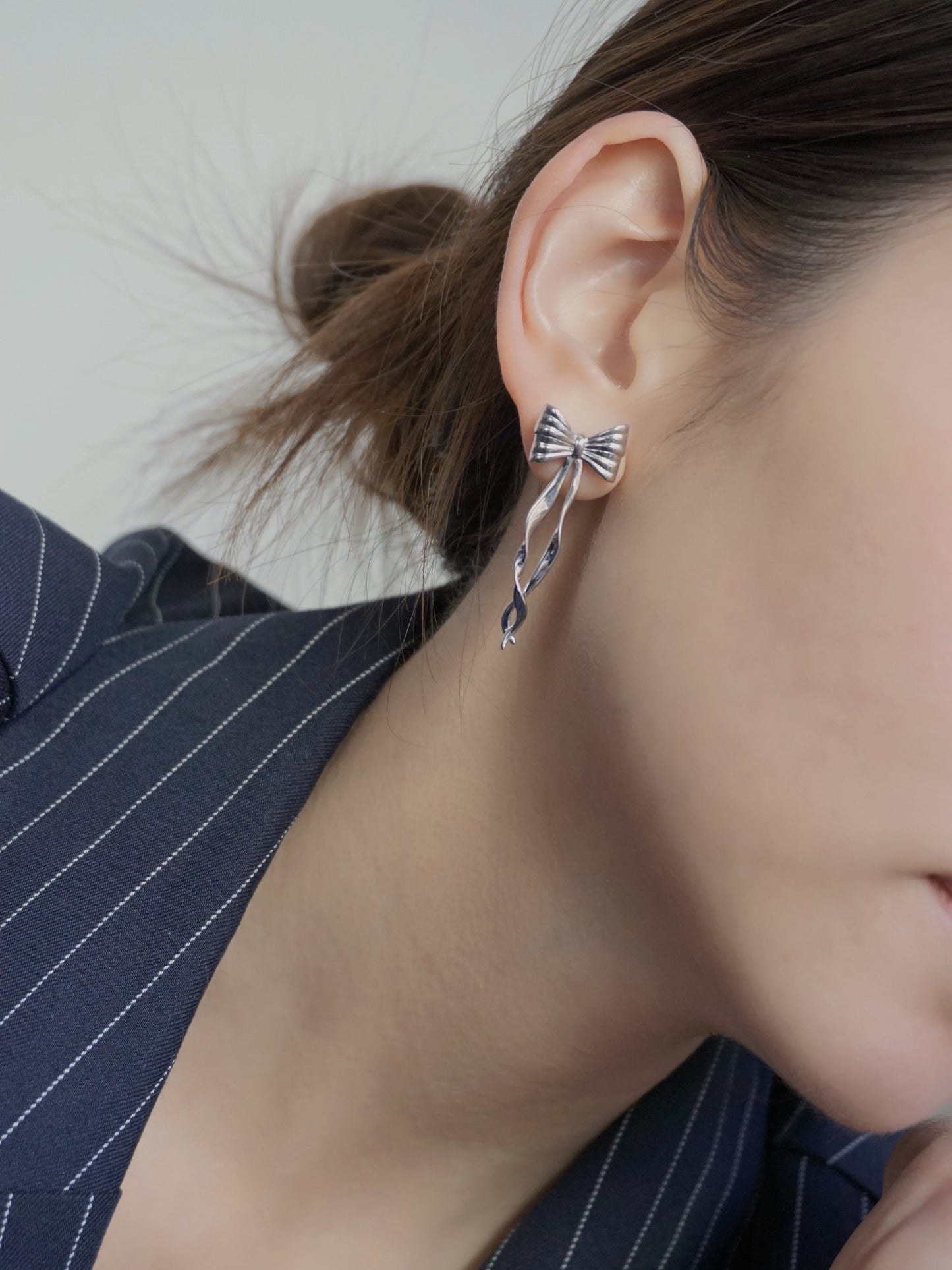 Bow Flutter Earrings in Silver