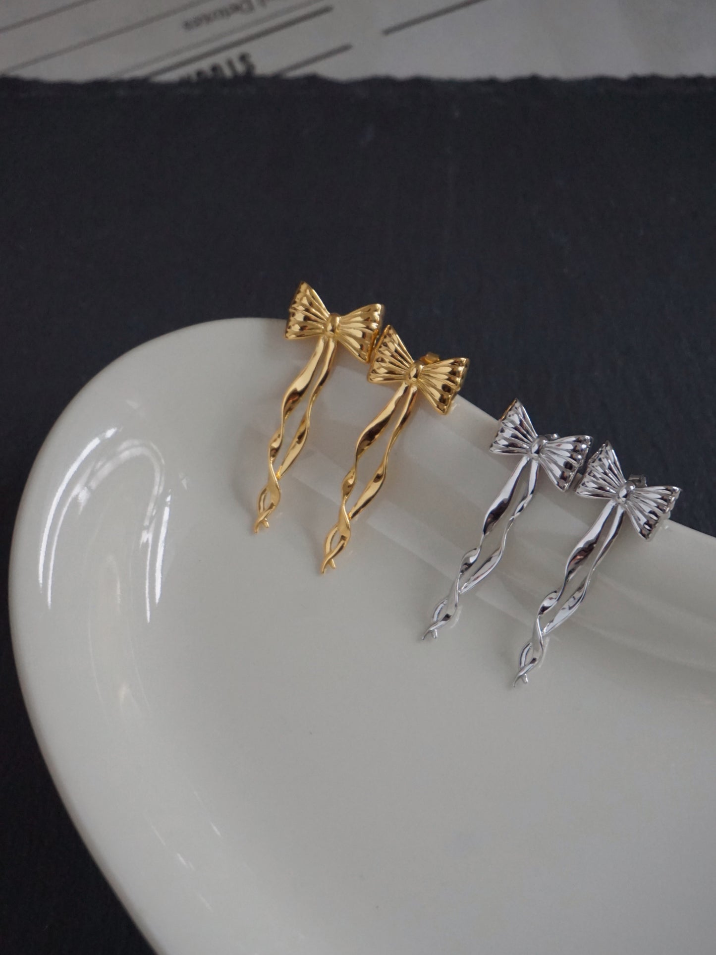 Bow Flutter Earrings in Silver