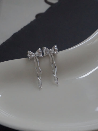 Bow Flutter Earrings in Silver