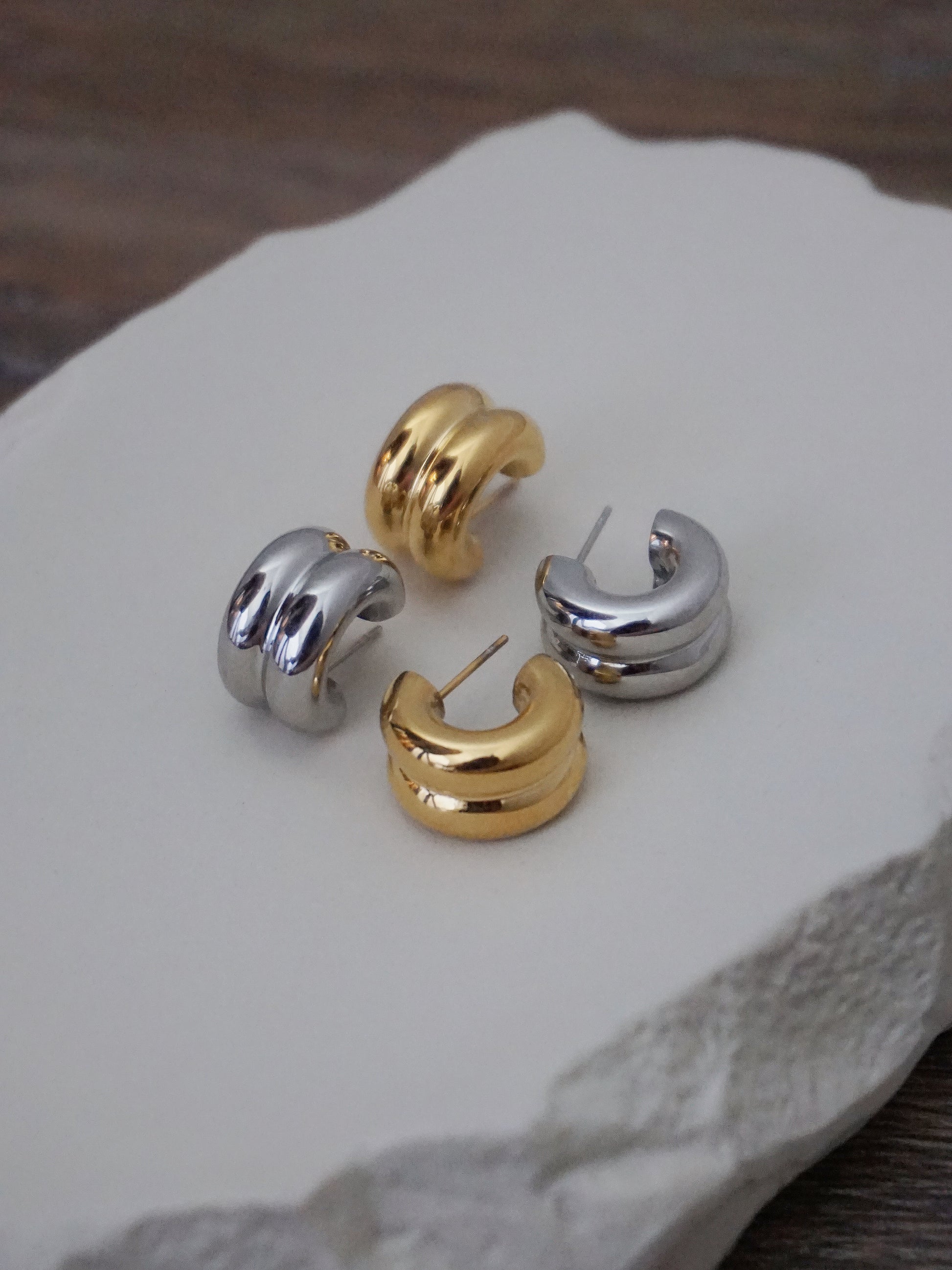 mini puffy hoops from third tone jewelry. affordable NYC jewelry brands.