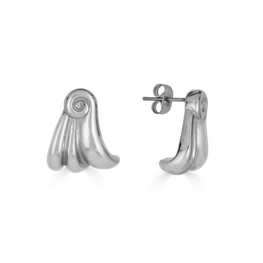 A pair of silver earrings featuring a spiral design with wing-like details, symbolizing the earth and new beginnings.
