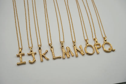 Initial Necklace for Women. Gold initial necklace.  Brands like Mejuri. Writing your name in ice just took on a whole new meaning. Better get started on your ABCs. Pair it with Chain Necklace or Baby Box Chain Necklace. Chain is sold separately.