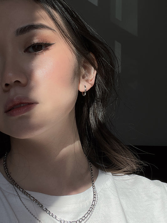 everyday small silver hoop earrings. comfortable hoop earrings, waterproof small hoop earrings, nontarnish hoop earrings. Minimal jewelry brands